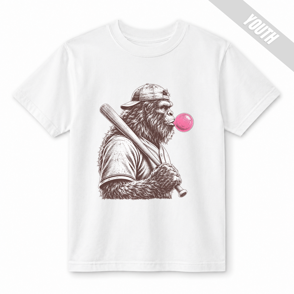 White youth baseball T-shirt featuring a vintage-style Bigfoot holding a baseball bat and blowing a bright pink bubble.