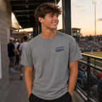 Teen wearing a Granite baseball T-shirt with Field Life at the Ballpark chest graphic during a casual evening at the ballpark.