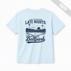 Chambray youth baseball T-shirt with large “Late Nights at the Ballpark” back graphic.