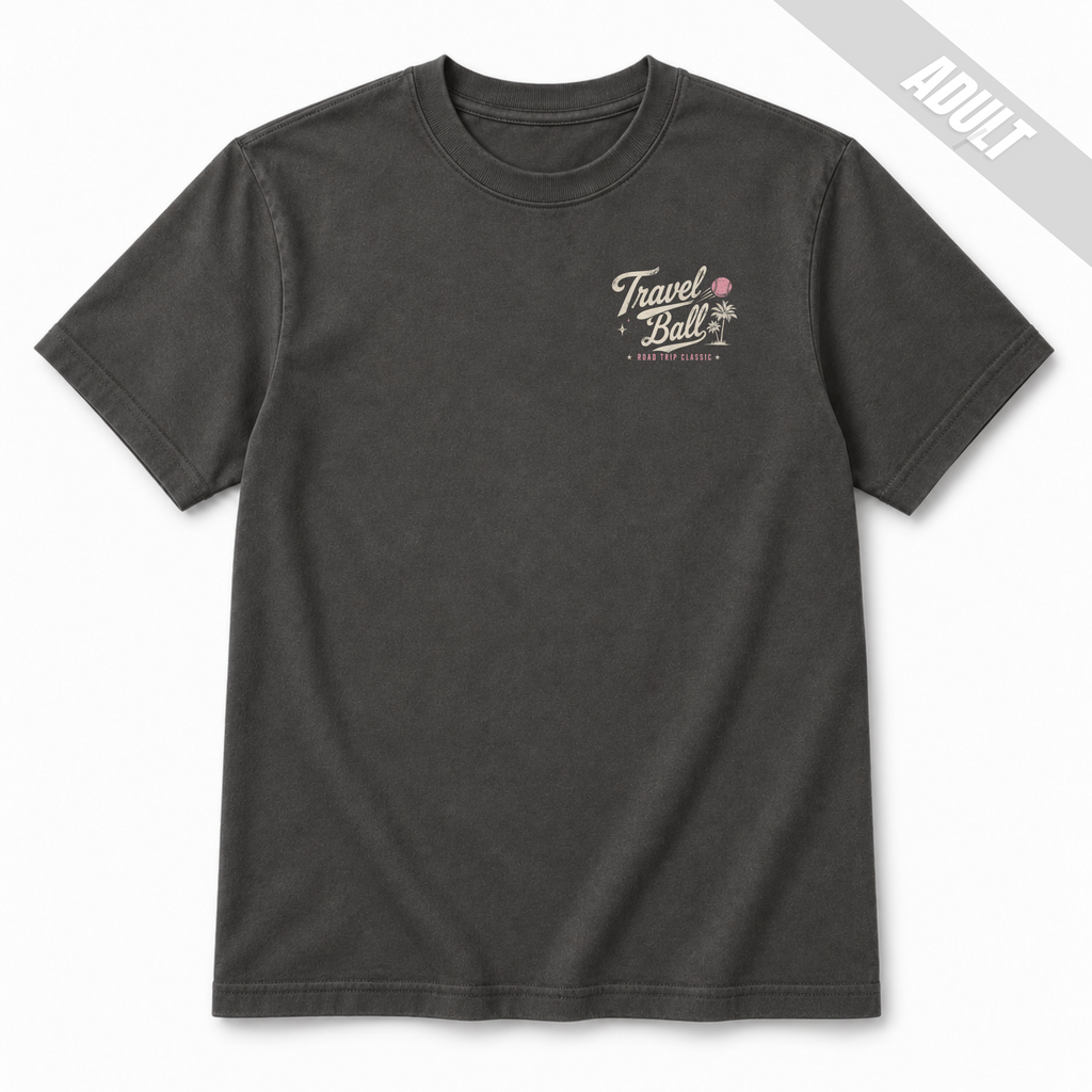 Front view of an adult Pepper travel ball T-shirt with a small left chest Travel Ball Road Trip Classic graphic in off-white and pink.